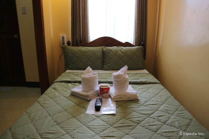 Imagen de la habitación del Hotel Tres Pension House. Foto 11