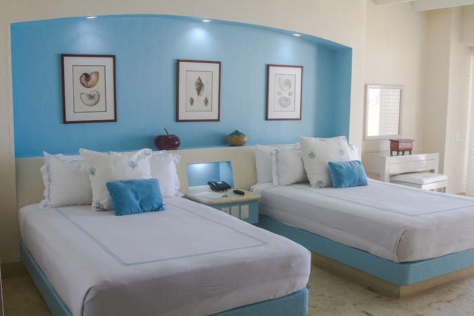 Imagen de la habitación del Hotel Tres Vidas Acapulco Suites. Foto 10