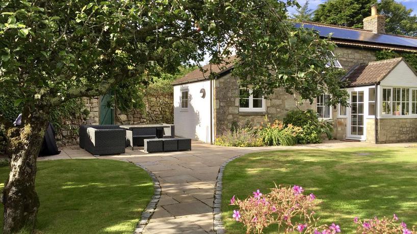 Imagen de los exteriores del Hotel Tresowes Green Cottage. Foto 16