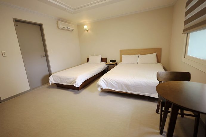 Imagen de la habitación del Hotel Trevi, Jeju. Foto 9