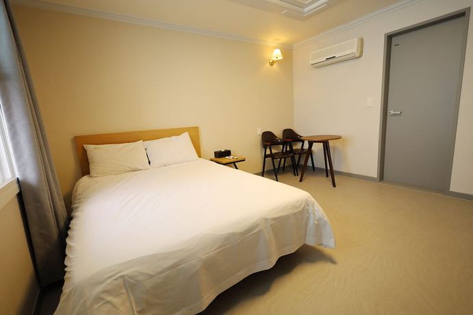 Imagen de la habitación del Hotel Trevi, Jeju. Foto 11