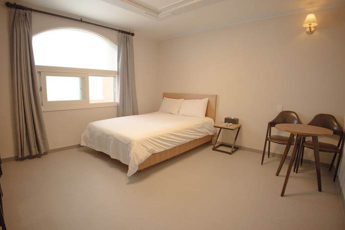 Imagen de la habitación del Hotel Trevi, Jeju. Foto 12