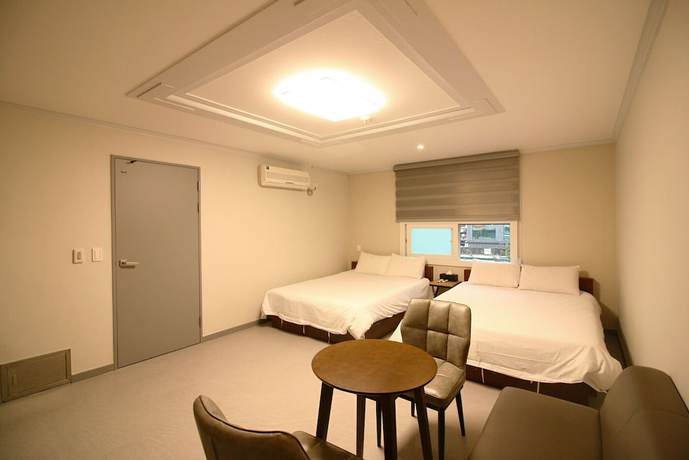 Imagen de la habitación del Hotel Trevi, Jeju. Foto 15