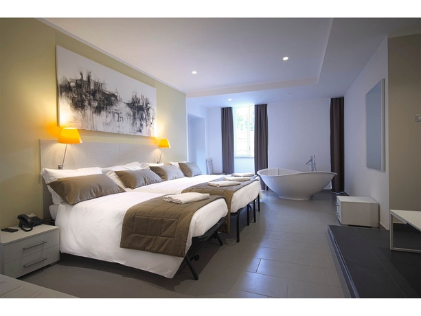 Imagen de la habitación del Hotel Trevi Palace. Foto 13