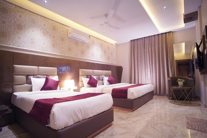 Imagen de la habitación del Hotel Trevon Siya Ramaya Inn. Foto 13
