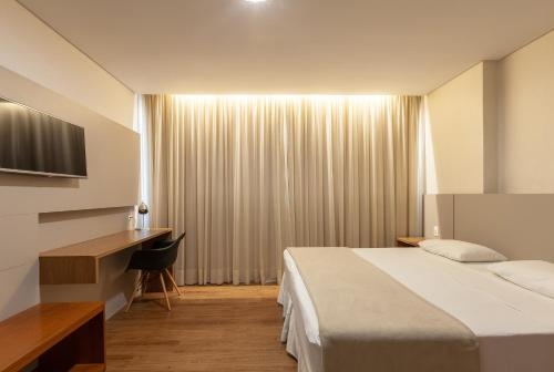 Imagen de la habitación del Hotel Tri Executive Brusque. Foto 9