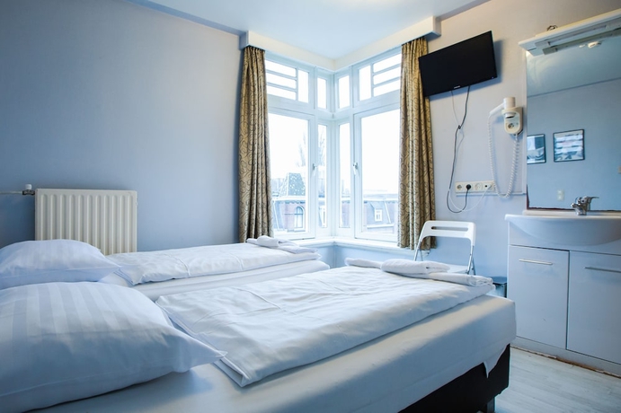 Imagen de la habitación del Hotel Trianon, Ámsterdam. Foto 6