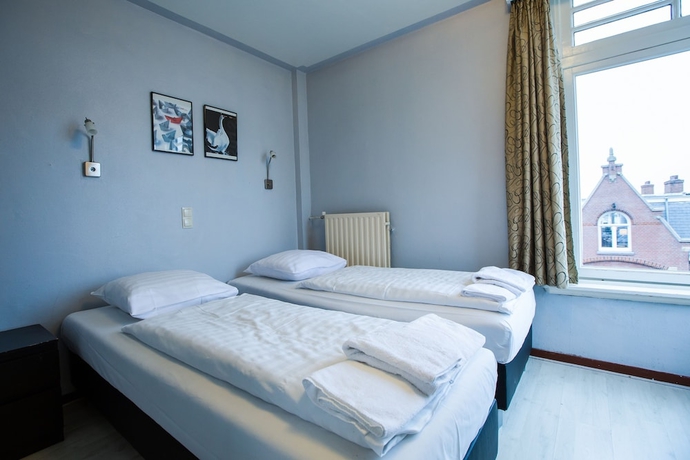 Imagen de la habitación del Hotel Trianon, Ámsterdam. Foto 7