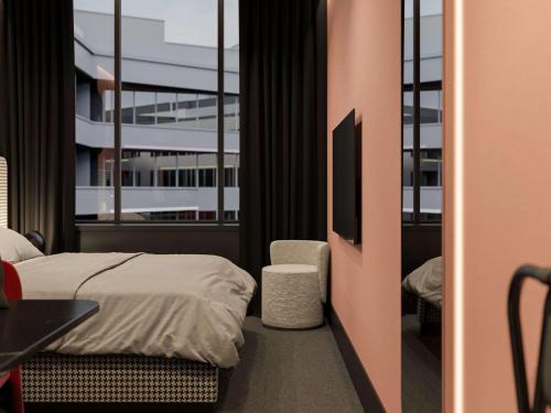 Imagen de la habitación del Hotel Tribe Budapest Stadium. Foto 14