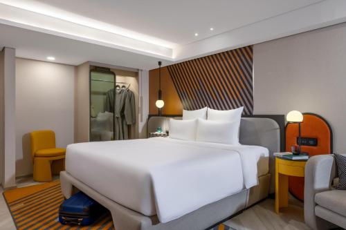 Imagen de la habitación del Hotel Tribe Living Bangkok Sukhumvit 39. Foto 11