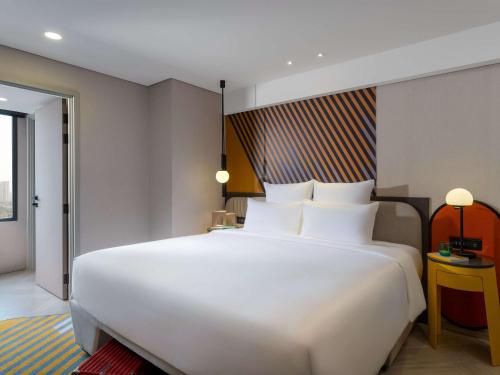 Imagen de la habitación del Hotel Tribe Living Bangkok Sukhumvit 39. Foto 15