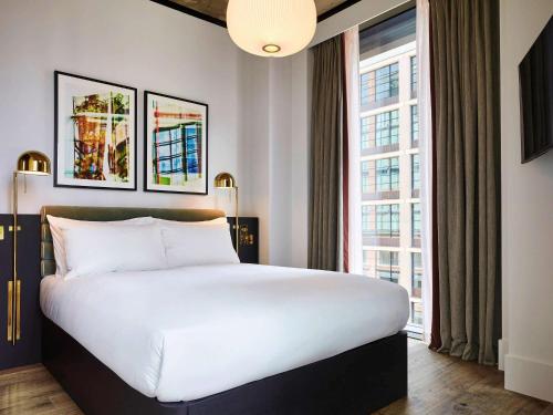 Imagen de la habitación del Hotel Tribe London Canary Wharf. Foto 7