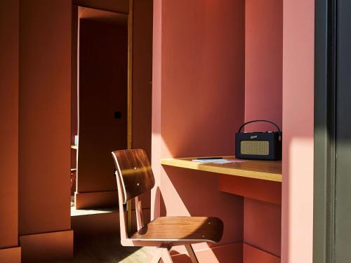 Imagen de los interiores del Hotel Tribe London Canary Wharf. Foto 13