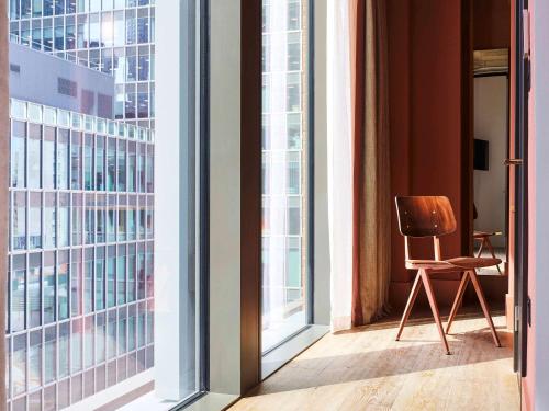 Imagen de los interiores del Hotel Tribe London Canary Wharf. Foto 14