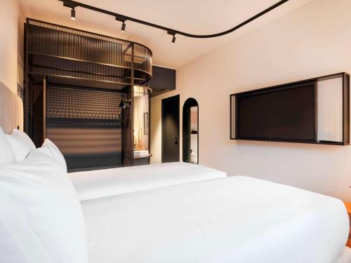 Imagen de la habitación del Hotel Tribe Milano Malpensa. Foto 13