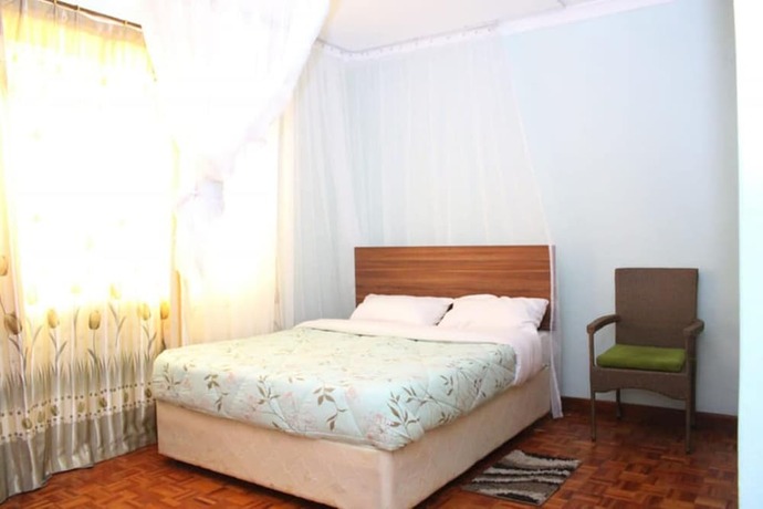 Imagen de la habitación del Hotel Tribu Guesthouse Nakuru. Foto 8