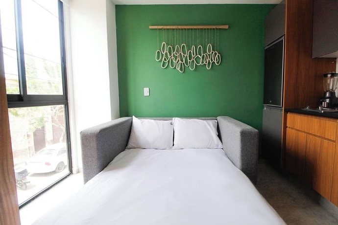Imagen de la habitación del Hotel Tribu Santa Tere. Foto 16