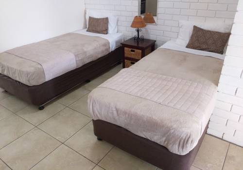 Imagen de la habitación del Hotel Trickett Gardens Holiday Inn. Foto 3
