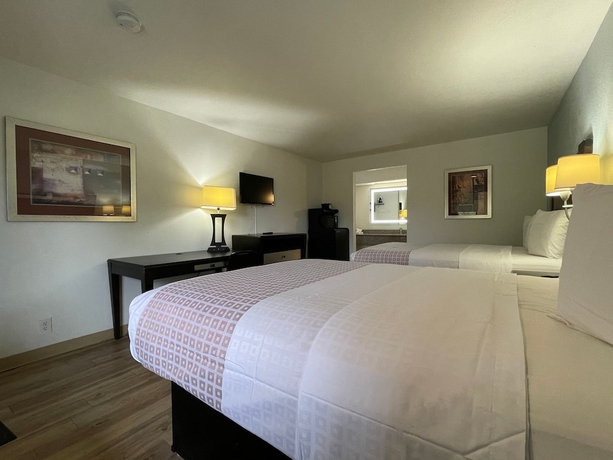 Imagen de la habitación del Hotel Tricove Inn & Suites. Foto 8