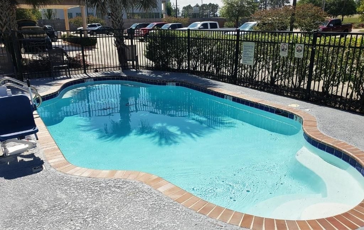 Imagen de la piscina del Hotel Trident Inn and Suites, Baton Rouge. Foto 19