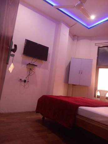 Imagen de la habitación del Hotel Tridev PG Residency. Foto 2