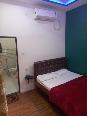 Imagen de la habitación del Hotel Tridev PG Residency. Foto 4