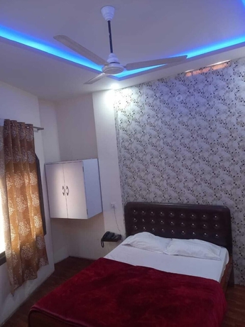 Imagen de la habitación del Hotel Tridev PG Residency. Foto 5