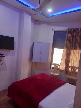 Imagen de la habitación del Hotel Tridev PG Residency. Foto 7