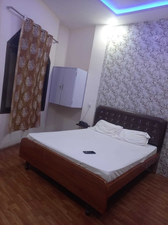 Imagen de la habitación del Hotel Tridev PG Residency. Foto 8