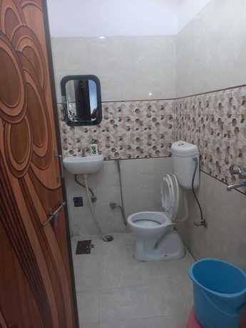 Imagen de la habitación del Hotel Tridev PG Residency. Foto 9