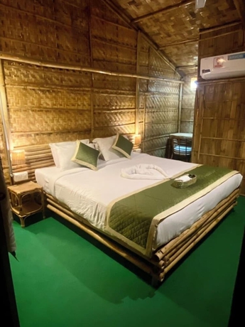 Imagen de la habitación del Hotel Tridhara Homestay. Foto 2