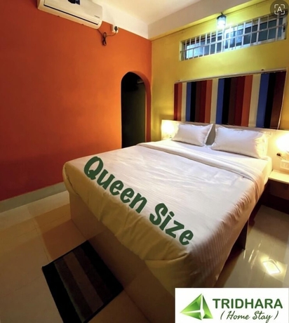Imagen de la habitación del Hotel Tridhara Homestay. Foto 4