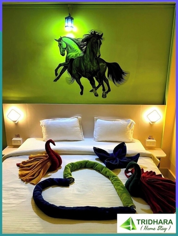 Imagen de la habitación del Hotel Tridhara Homestay. Foto 7
