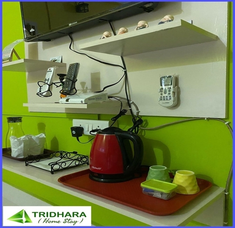 Imagen de la habitación del Hotel Tridhara Homestay. Foto 9