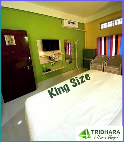 Imagen de la habitación del Hotel Tridhara Homestay. Foto 10