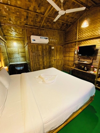 Imagen de la habitación del Hotel Tridhara Homestay. Foto 13