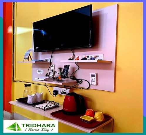 Imagen de la habitación del Hotel Tridhara Homestay. Foto 15