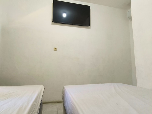 Imagen de la habitación del Hotel Trikora Guesthouse Syariah 1. Foto 6