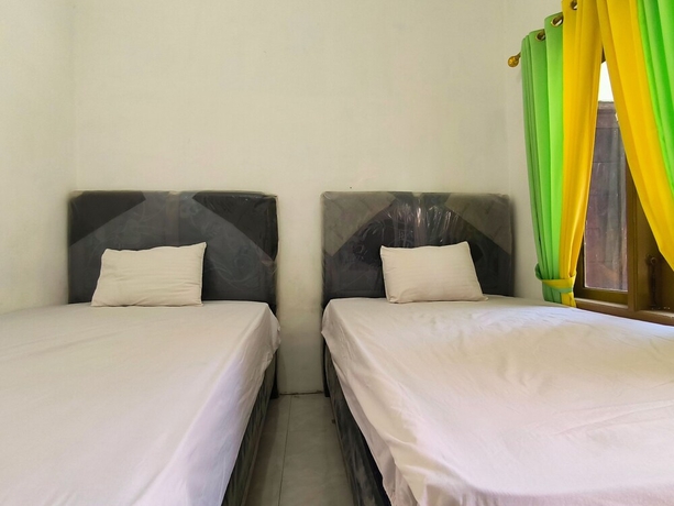 Imagen de la habitación del Hotel Trikora Guesthouse Syariah 1. Foto 8