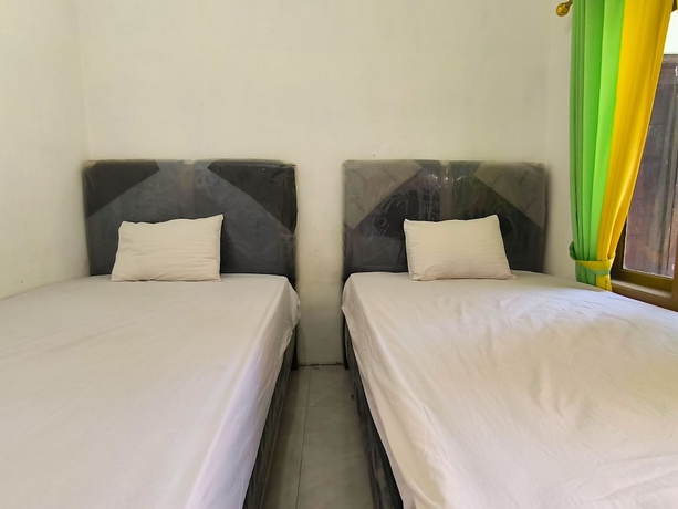 Imagen de la habitación del Hotel Trikora Guesthouse Syariah 1. Foto 9