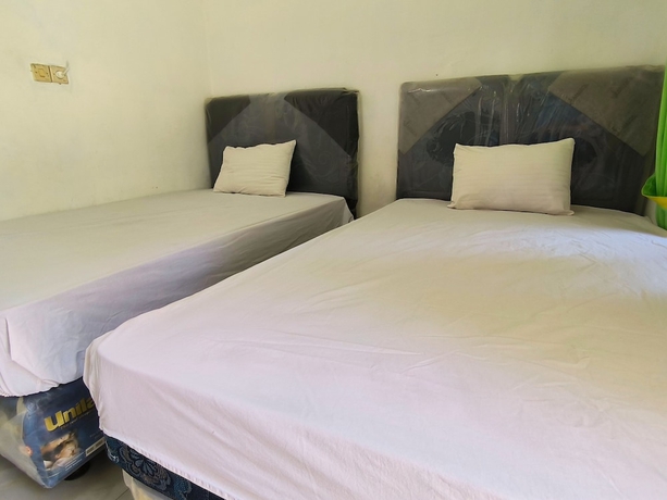 Imagen de la habitación del Hotel Trikora Guesthouse Syariah 1. Foto 11