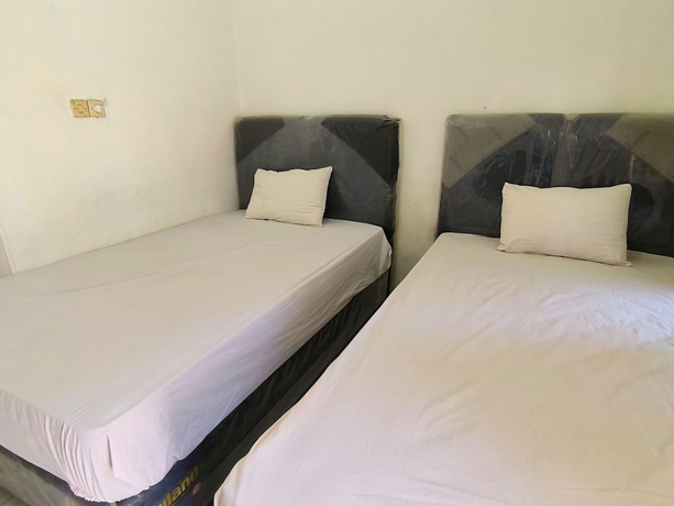 Imagen de la habitación del Hotel Trikora Guesthouse Syariah 1. Foto 12