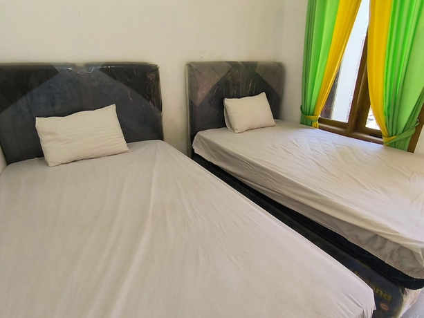 Imagen de la habitación del Hotel Trikora Guesthouse Syariah 1. Foto 13