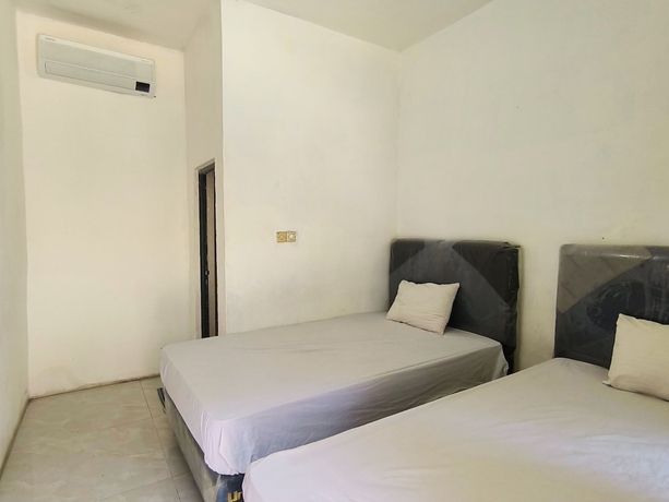 Imagen de la habitación del Hotel Trikora Guesthouse Syariah 1. Foto 14
