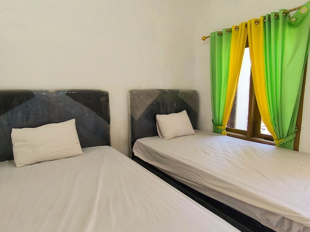 Imagen de la habitación del Hotel Trikora Guesthouse Syariah 1. Foto 15