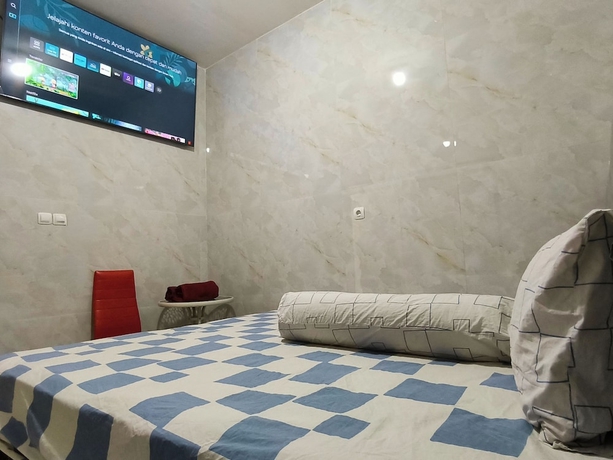 Imagen de la habitación del Hotel Trikora Guesthouse Syariah 2. Foto 5