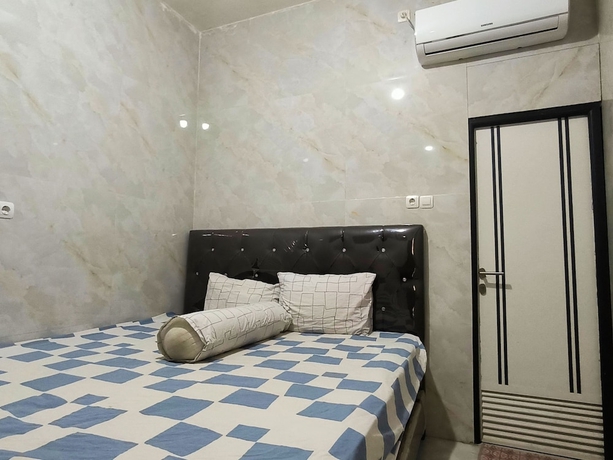 Imagen de la habitación del Hotel Trikora Guesthouse Syariah 2. Foto 6