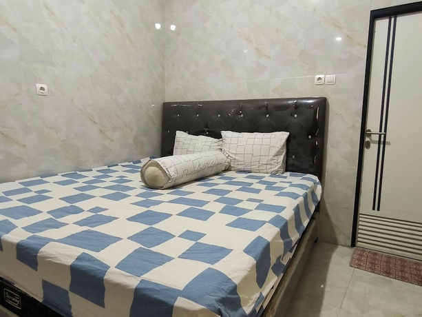 Imagen de la habitación del Hotel Trikora Guesthouse Syariah 2. Foto 7