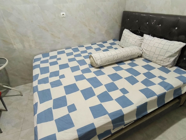 Imagen de la habitación del Hotel Trikora Guesthouse Syariah 2. Foto 8