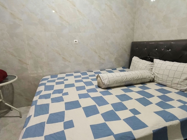 Imagen de la habitación del Hotel Trikora Guesthouse Syariah 2. Foto 9